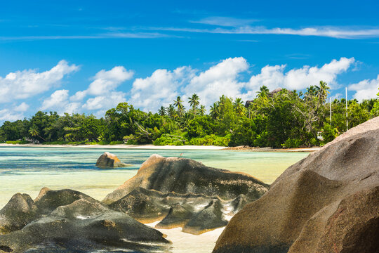 Beautifully shaped granite boulders and a perfect white sand at the famous Anse Source d'Argent beach, La Digue island, Seychelles