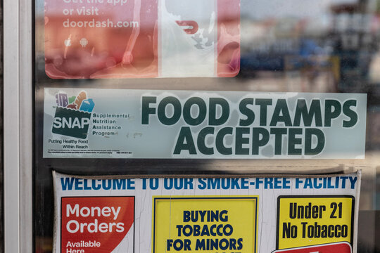 We Welcome SNAP Benefits Sign. SNAP And Food Stamps Provide Nutrition Benefits To Assist Disadvantaged Families.