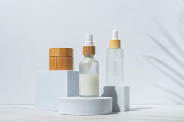 Trendy background with natural cosmetic skincare bottles. Product presentation. Beauty and body...
