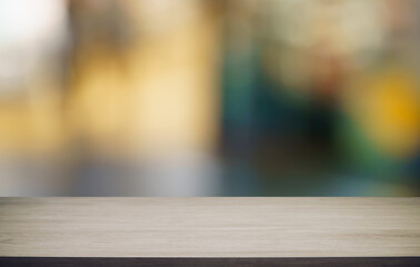 Empty wood table top and blur of out door garden background Empty wooden table space for text...