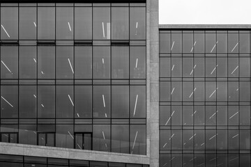 Black and white tone, Exterior architectural detail modern facade of High-rise office buildings. Abstract Urban metropolis background.