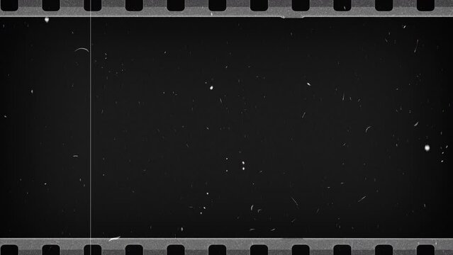 Vintage looping film strip background. 4K reel clutter old tv grain noise frame. Videotape texture overlay with scratches and dirt stains. Lens flare light leaks effect