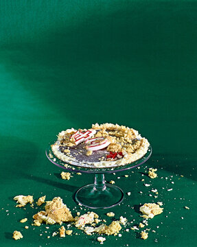 cake destroyed table green background celebration cake stand
