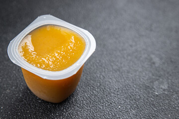 fruit puree portion apple, pear fruit no sugar meal food snack on the table copy space food background rustic top view 