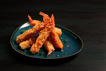 Fried shrimp, peeled in tempura, soy sauce, close-up,