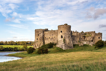 Fototapeta na wymiar The enchanting ruins of Carew Castle situated by the banks of the River Carew in Pembrokeshire, Wales