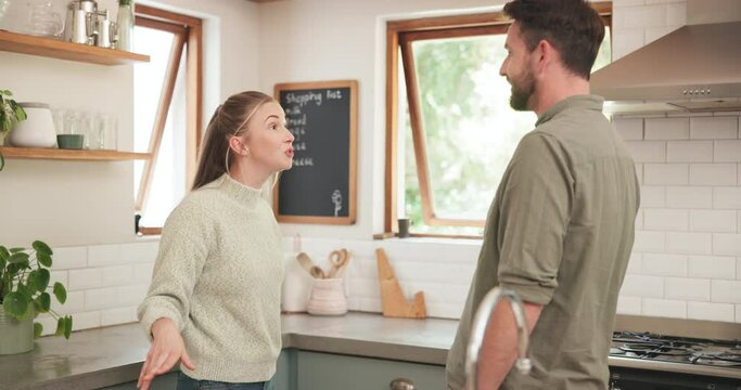 Angry couple, conflict and argue in home for problem, breakup trouble and toxic relationship in kitchen. Divorce, fight and frustrated man blame unhappy woman for cheating, drama and stress of affair