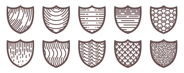 A set of decorative elements in the form of a medieval shield with different patterns