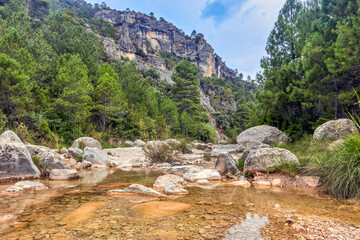 Fototapeta na wymiar La Pesquera natural area with the ulldemo river in its path. In Beceite, Matarraña Region, Teruel, Aragon, Spain