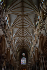 decorated stain glass windows corridor archway	