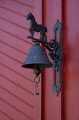 The bell on the old door