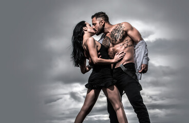 Romantic sexy couple kissing. Sensual couple in love kissing. Passion, dating and love. Young beautiful sexy lovers kissing. Sensual relationship. Sexy elegant couple in the tender passion kissing.