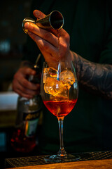Bartender make cocktail