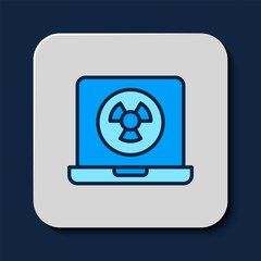 Filled outline Nuclear laptop icon isolated on blue background. Vector