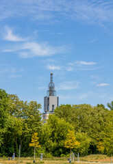 A residential tower on the Havel River viewed from Nuthe Park, Potsdam, Brandenburg, Germany