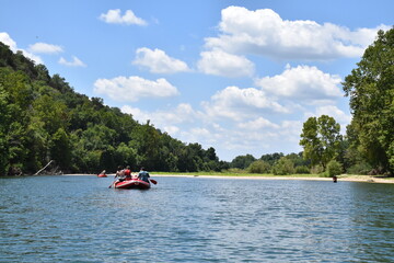 Fototapeta na wymiar Raft on a River