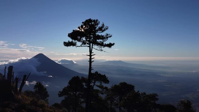 Filmed during a campout on Acatenango Volcano in 2022, "Vulcan de Fuego&acute;&acute;" erupts and smoke plumes lift up against the rising sun. Watching the raw power of the earth has something majestic.