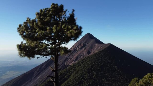 Filmed during a campout on Acatenango Volcano in 2022, "Vulcan de Fuego&acute;&acute;" erupts and smoke plumes lift up against the rising sun. Watching the raw power of the earth has something majestic.