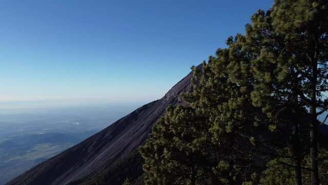 Filmed during a campout on Acatenango Volcano in 2022, "Vulcan de Fuego&acute;&acute;" erupts and smoke plumes lift up against the rising sun. Watching the raw power of the earth has something majestic.
