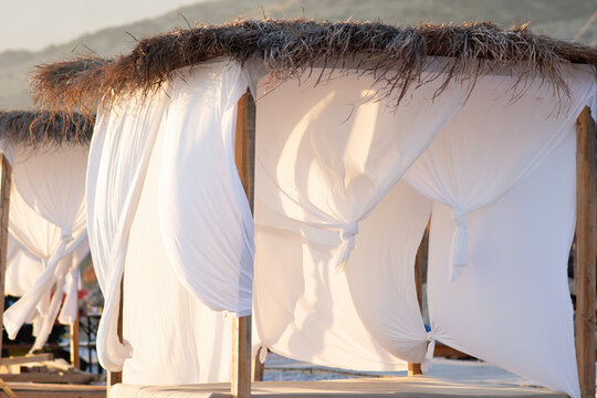 White beach canopies. Luxury beach tents at a resort. Beach concept