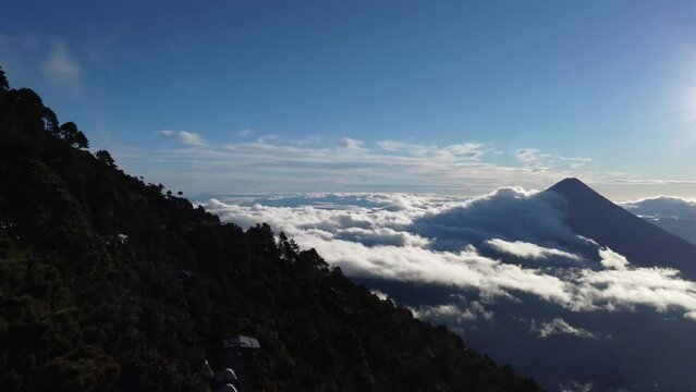 Filmed during a campout on Acatenango Volcano in 2022, "Vulcan de Fuego&acute;&acute;" erupts and smoke plumes lift up against the rising sun. Watching the raw power of the earth has something majestic.