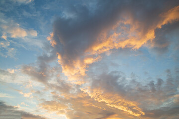 Fototapeta na wymiar Beautiful summer clouds at sunset.A fiery sunset in summer.