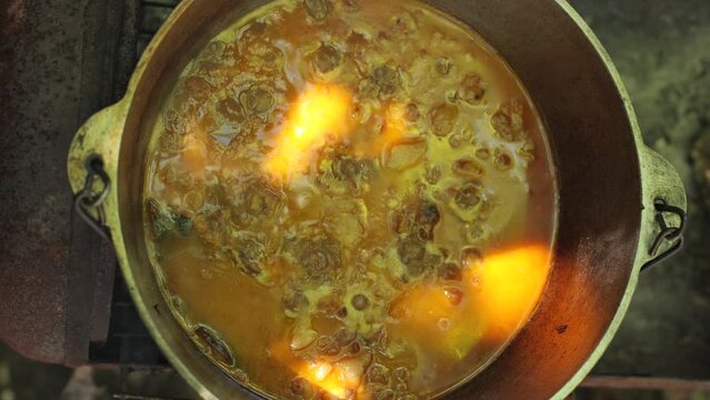 Cooking. summer vacation near the barbecue. Summer picnic, bonfire. Hot soup in a pot. Bograch in Transcarpathia, a Ukrainian dish.