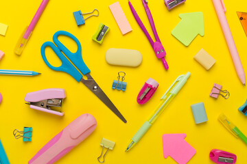 Flat lay with colorful school stationery on color backgroung, top view