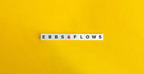 Ebbs and Flows Phrase on Block Letter Tiles.