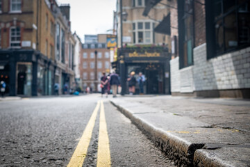 Fototapeta na wymiar London, West End- Defocussed view of Soho street scene, vibrant area of London's west end