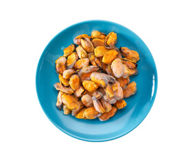 Frozen peeled mussels on a blue ceramic plate isolated on a white background, top view.