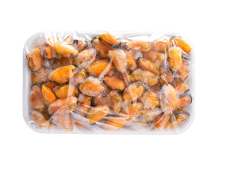 packaging mussels .white plastic plate of frozen peeled mussels, top view.