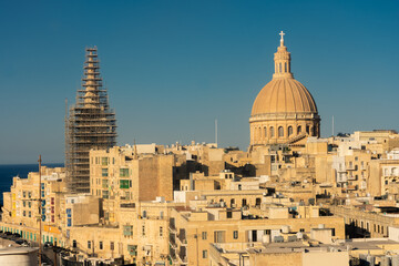 Fototapeta na wymiar Beautiful sunset cityscape of Valletta old town in Malta