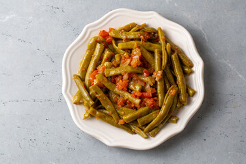 Traditional delicious Turkish food; Green beans with olive oil; Turkish name; Zeytinyagli taze...