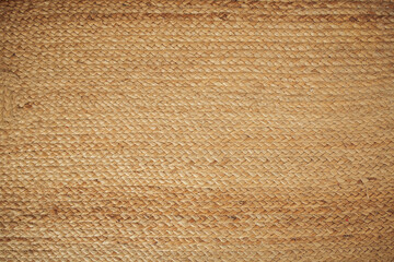 The structure of the wicker surface of straw. Woven from material with warm shades. Background pattern of square handicraft weave texture wicker for furniture material. Organic material. Eco concept. - obrazy, fototapety, plakaty