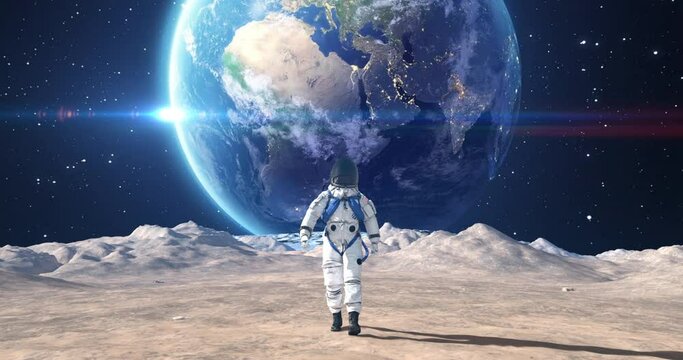 Brave Young Male Astronaut in Space Suit Confidently Walking On Mars. Planet Earth Is Visible In Sky. Slow Motion.