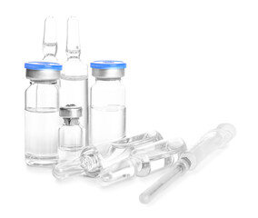 Medical ampules on white background