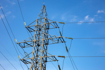 power line support with wires for electricity transmission. High voltage grid tower with wire cable...