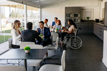 office business diverse people in kitchen coworking, break, lunch, social inclusion