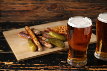 Glasses of cold beer on wooden background. Oktoberfest celebration