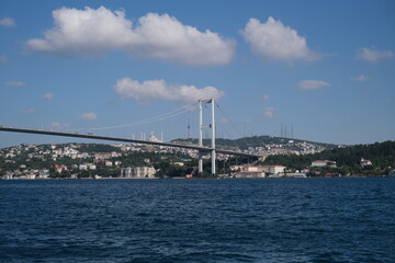 The Bosphorus Bridge Connecting Europe and Asia on a Cloudy Summer Day