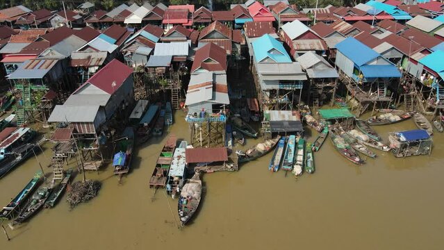 Floating village on a river, Kampong Phluk, Cambodia, Boats, fisherman, 4k Drone footage