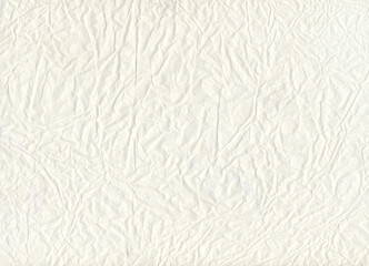 Crumpled light wrapping paper. Texture template of background.
