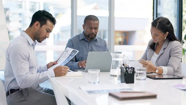Laptop, meeting and accountant team working on a budget or company budget proposal or project together in an office. Corporate, teamwork and employees or team in planning finance strategy or growth