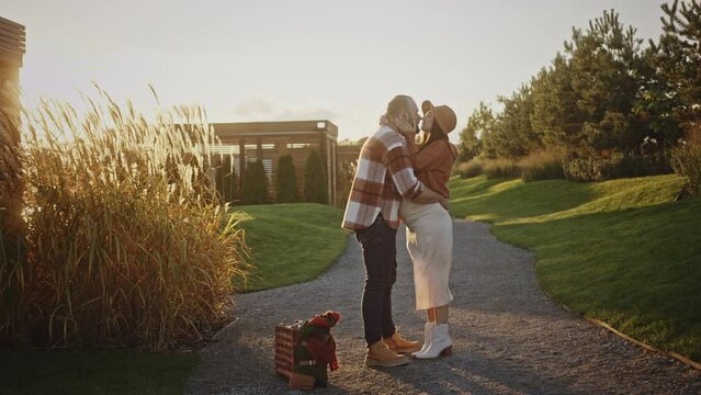 Woman And Man Kissing In Guesthouse Resort Go On Picnic