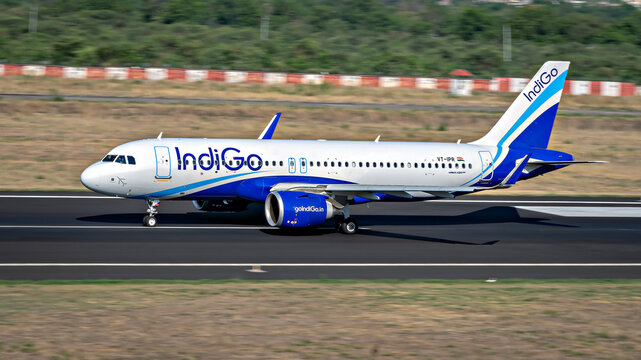 Nagpur, Maharashtra, India-June 12th, 2023: Indigo flight taxying back to terminal on runway.