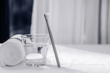 Toothbrush on table with blurred background. Morning procedures and personal care, health care, health hygiene.