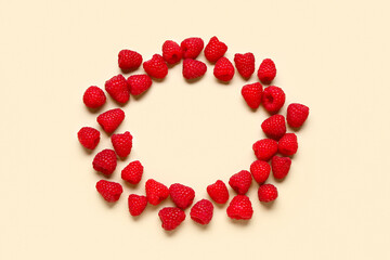 Frame made of fresh raspberries on light background