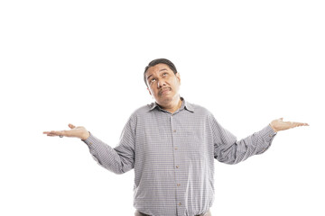 old asian man shrugging his shoulders showing i dont know gesture or clueless in front of white background isolated