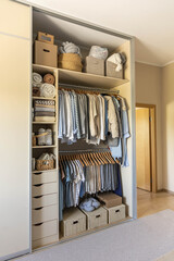 Concept of decluttering, organizing and tidiness in closet. Storage for apparel, socks and shirts.